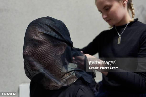 Artists dress up before a theater representation on September 21, 2017 in Minsk, Belarus. Young Theater artists from Bulgaria, Belarus, Chile,...