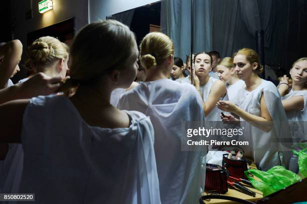 Artists dress up before a theater representation on September 21, 2017 in Minsk, Belarus. Young Theater artists from Bulgaria, Belarus, Chile,...
