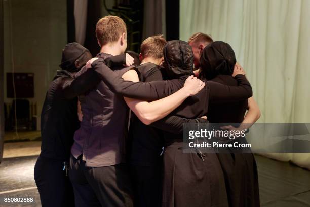 Artists hug each other before a theater representation on September 21, 2017 in Minsk, Belarus. Young Theater artists from Bulgaria, Belarus, Chile,...