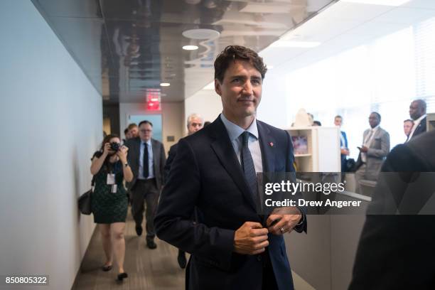 Canadian Prime Minister Justin Trudeau exits after a press briefing during the United Nations General Assembly at UN headquarters, September 21, 2017...