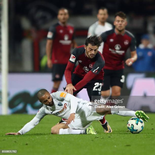 Sidney Sam of Bochum is challenged by Tim Leibold of Nuernberg during the Second Bundesliga match between 1. FC Nuernberg and VfL Bochum 1848 at...