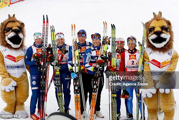 Virpi Kuitunen and Aino-Kaisa Saarinen of Finland take 1st place, Lina Andersson and Anna Olsson of Sweden take 2nd place, and Arianna Follis...