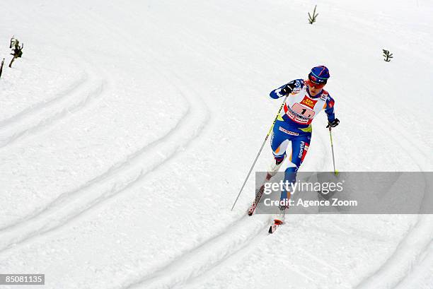 Finland team member Aino-Kaisa Saarinen on her way to taking 1st place in the FIS Nordic World Ski Championships Cross Country Ladies Free Team...