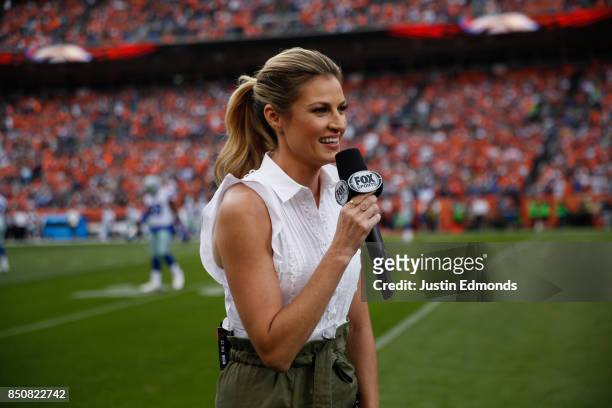 Fox Sports sideline reporter Erin Andrews reports from the sidelines during a game between the Denver Broncos and the Dallas Cowboys at Sports...