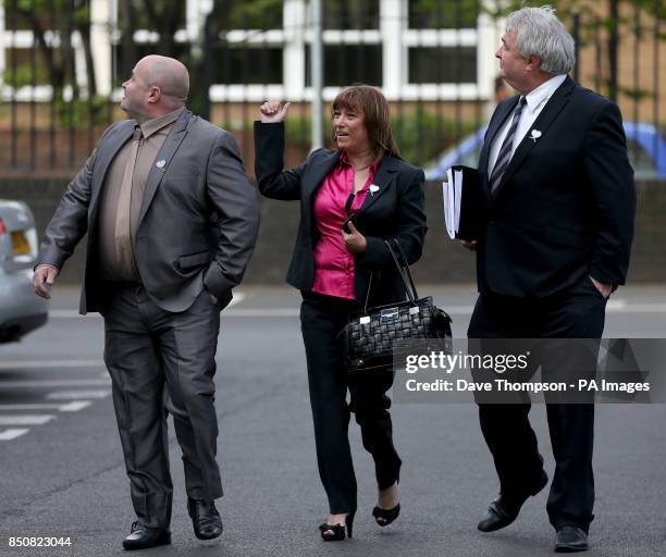 Denise Fergus arrives at Burlington House in Crosby, Merseyside, with her husband Stuart and solicitor Sean Sexton .