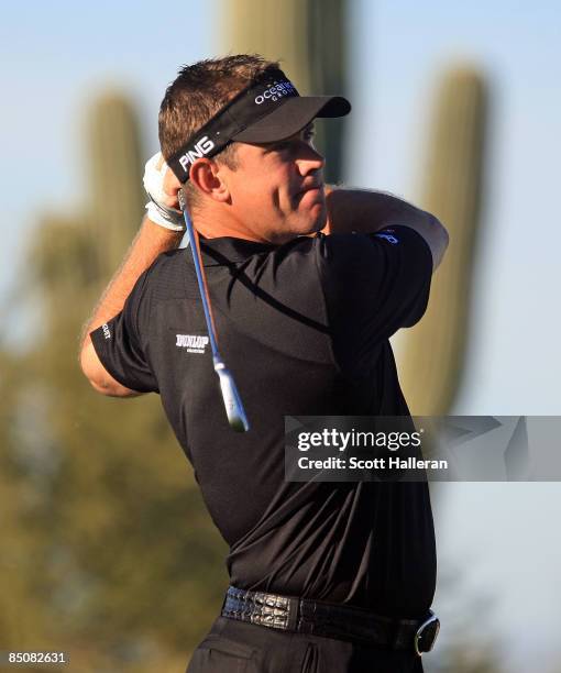 Lee Westwood of England hits his tee shot on the fourth hole during the first round of the Accenture Match Play Championship at the Ritz-Carlton Golf...