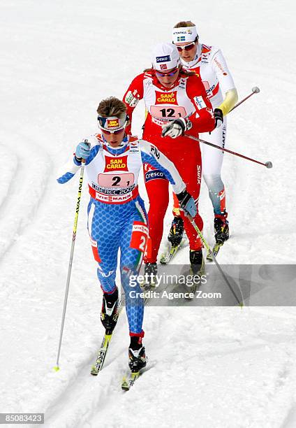 Italy team member Marianna Longa and Sweden team member Anna Olsson in action during the FIS Nordic World Ski Championships Cross Country Ladies Free...