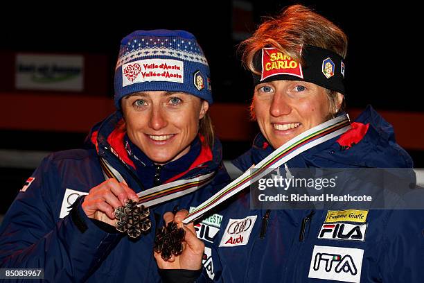 Arianna Follis and Marianna Longa of Italy pose with the Bronze medals won during the Ladies Cross Country Team Sprint Final at the FIS Nordic World...