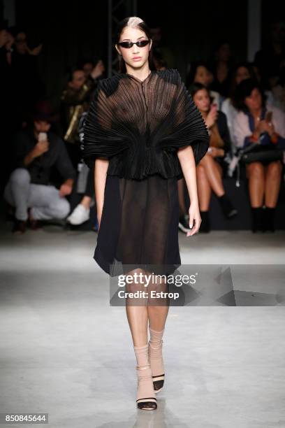 Model walks the runway at the Alberto Zambelli show during Milan Fashion Week Spring/Summer 2018 on September 20, 2017 in Milan, Italy.