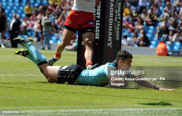 London Broncos' Michael Witt goes over to score a try during the Super League Magic Weekend at the Etihad Stadium, Manchester.