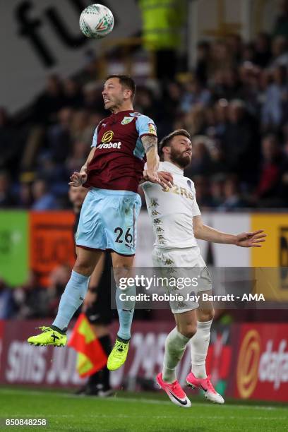 Phillip Bardsley of Burnley and Stuart Dallas of Leeds United during the Carabao Cup Third Round match between Burnley and Leeds United at Turf Moor...