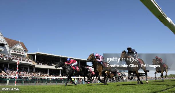 Kingsgate Native and Shane Kelly beat Swiss Spirit and William Buick and Reckless Abandon and Adam Kirby to win the Betfred temple Stakes during...