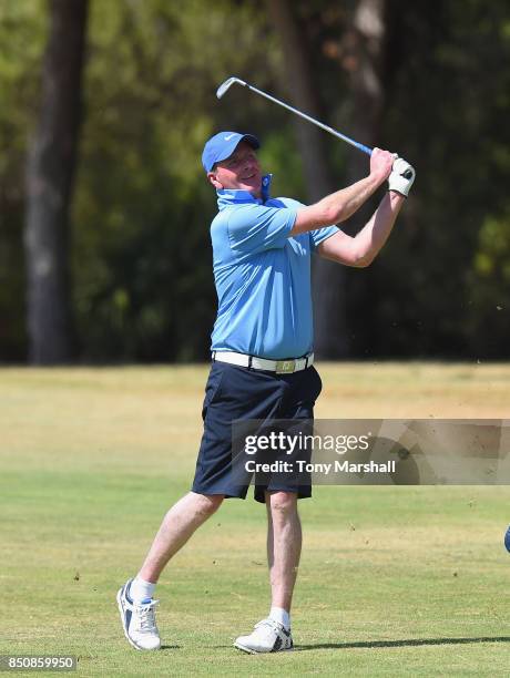 Andrew Manson of Edenmore Golf & Country Club plays his second shot on the 18th fairway during The Lombard Trophy Final - Day One on September 21,...