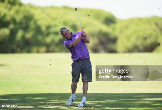 Nigel Onions of Wolstanton Golf Club plays his second shot on the 18th fairway during The Lombard Trophy Final - Day One on September 21, 2017 in...