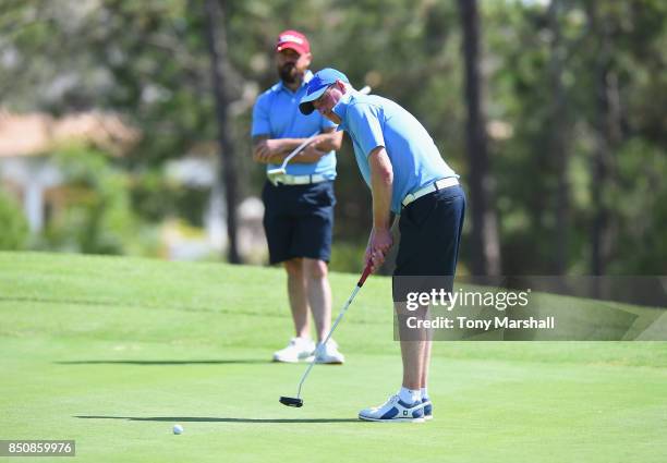 Andrew Manson of Edenmore Golf & Country Club putts on the 18th green during The Lombard Trophy Final - Day One on September 21, 2017 in Albufeira,...