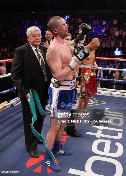 Tony Bellew celebreates defeating Isaac Chilemba during their WBC Silver Light Heavyweight Championship and World Final Eliminator at the O2 Arena,...