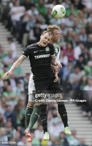 Hibernian's Jordon Forster and Celtic's Anthony Stokes fight for the ball during the William Hill Scottish Cup Final at Hampden Park, Glasgow.