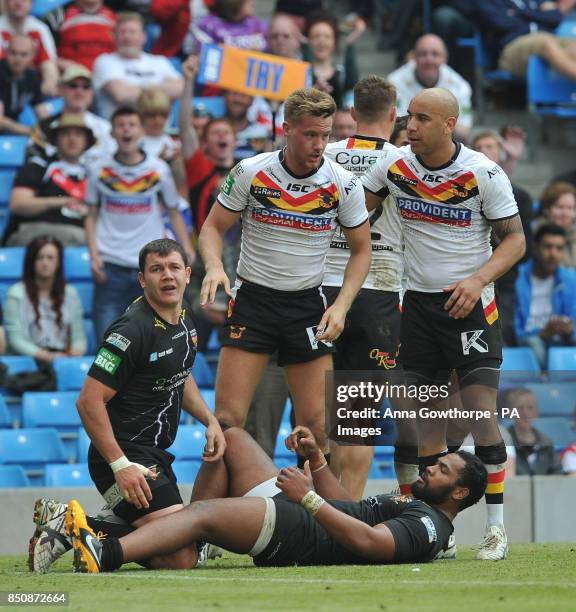 Bradford Bulls' Jamie Foster is congratulated after scoring a try during the Super League Magic Weekend at the Etihad Stadium, Manchester.
