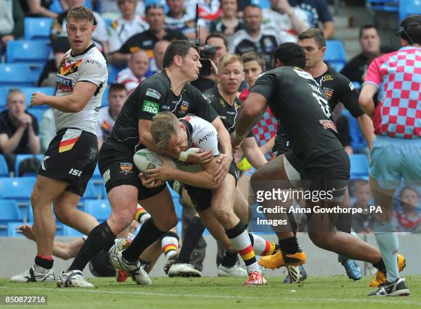 Bradford Bulls' Jamie Foster forces his way over to score a try during the Super League Magic Weekend at the Etihad Stadium, Manchester.