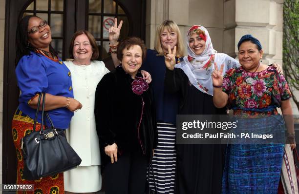 Nobel Laureates Leymah Gbowee, Mairead Maguire, Shirin Ebadi, Jody Williams, Tawakkol Karman, Rigoberta Menchu Tum arriving at Belfast City H to...