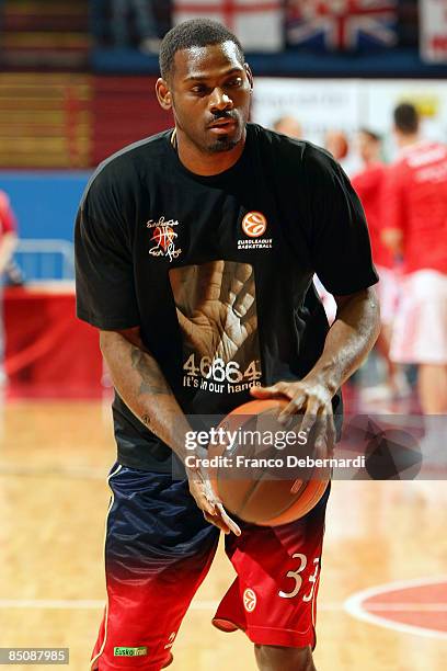 Pete Mickeal, #33 of TAU Ceramica wears a 46664 campaign t-shirt before the Euroleague Basketball Last 16 Game 4 match between Armani Jeans Milano v...