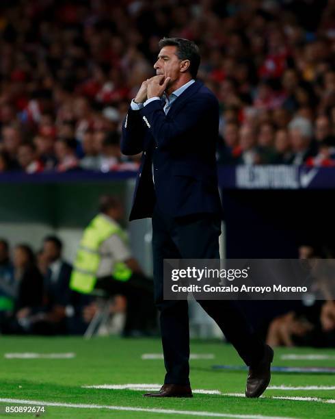 Head coach Michel Gonzalez of Malaga CF gives instructions during the La Liga match between Club Atletico Madrid and Malaga CF at Estadio Wanda...