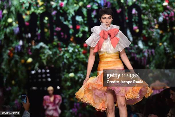 Bella Hadid walks the runway at the Moschino show during Milan Fashion Week Spring/Summer 2018 on September 21, 2017 in Milan, Italy.