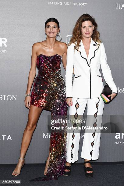 Sara Battaglia and Giovanna Battaglia walk the red carpet of amfAR Gala Milano on September 21, 2017 in Milan, Italy.