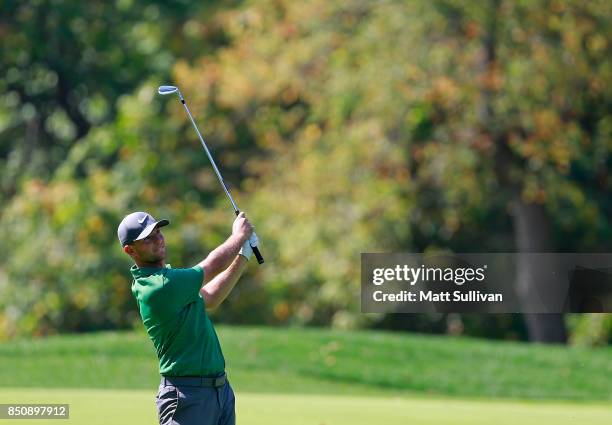 Luke Guthrie watches his second shot on the eighth hole during the first round of the Web.com Tour DAP Championship on September 21, 2017 in...