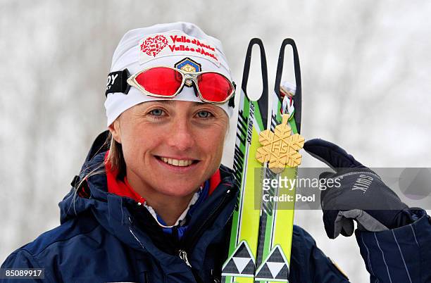 Arianna Follis of Italy poses with the Gold medal won during the Ladies Cross Country Sprint Final A at the FIS Nordic World Ski Championships 2009...