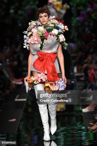 Model walks the runway at the Moschino Spring Summer 2018 fashion show during Milan Fashion Week on September 21, 2017 in Milan, Italy.