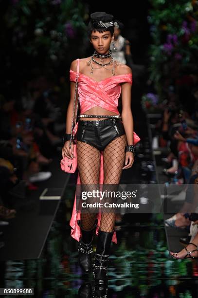 Model walks the runway at the Moschino Spring Summer 2018 fashion show during Milan Fashion Week on September 21, 2017 in Milan, Italy.