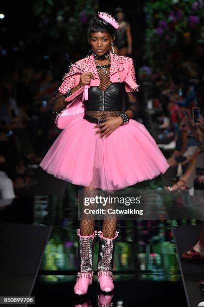 Model walks the runway at the Moschino Spring Summer 2018 fashion show during Milan Fashion Week on September 21, 2017 in Milan, Italy.