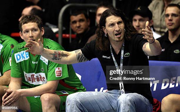 Manager Stefan Kretzschmar of Magdeburg gestures during the Toyota Handball Bundesliga match between SC Magdeburg and HSV Hamburg at the Boerdeland...