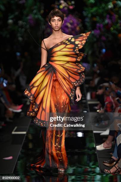 Model walks the runway at the Moschino Spring Summer 2018 fashion show during Milan Fashion Week on September 21, 2017 in Milan, Italy.