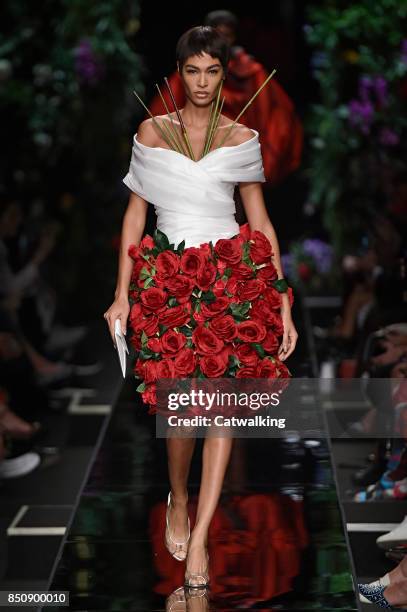 Model walks the runway at the Moschino Spring Summer 2018 fashion show during Milan Fashion Week on September 21, 2017 in Milan, Italy.