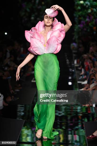 Model walks the runway at the Moschino Spring Summer 2018 fashion show during Milan Fashion Week on September 21, 2017 in Milan, Italy.