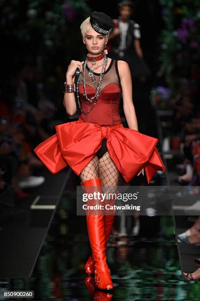 Model walks the runway at the Moschino Spring Summer 2018 fashion show during Milan Fashion Week on September 21, 2017 in Milan, Italy.