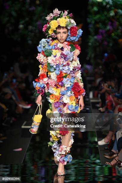 Model walks the runway at the Moschino Spring Summer 2018 fashion show during Milan Fashion Week on September 21, 2017 in Milan, Italy.