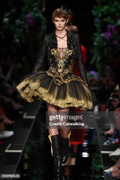 Model walks the runway at the Moschino Spring Summer 2018 fashion show during Milan Fashion Week on September 21, 2017 in Milan, Italy.