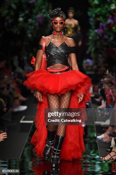 Model walks the runway at the Moschino Spring Summer 2018 fashion show during Milan Fashion Week on September 21, 2017 in Milan, Italy.