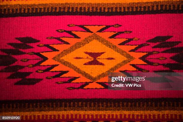 Colourful hand made patterned carpet, Teotitlan del Valle, near Oaxaca, Oaxaca State, Mexico.