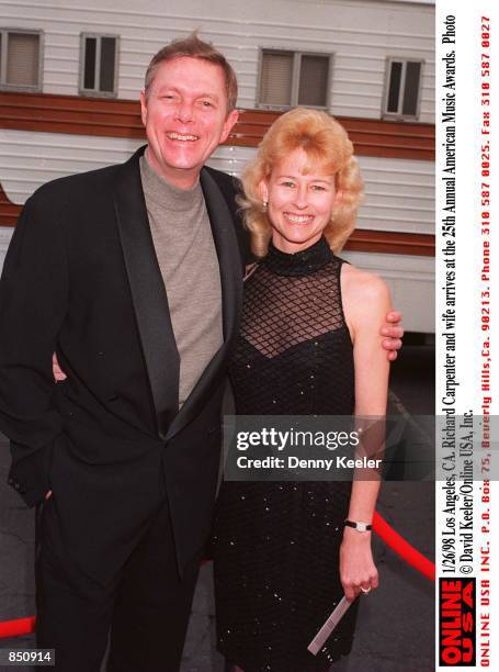 Los Angeles, CA. Richard Carpenter with his wife arrives at the 25th Annual American Music Awards rehearsal.