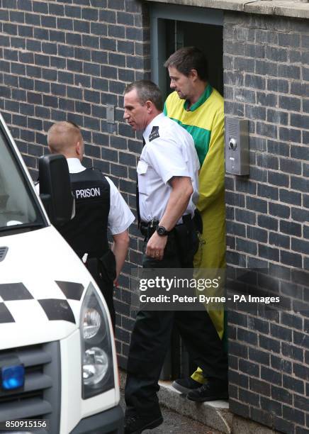 Mark Bridger leaves Mold Crown Court after he was given a whole life sentence for the abduction and murder of schoolgirl April Jones.