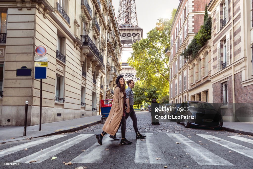 Lovely couple spending some days in vacation to Paris