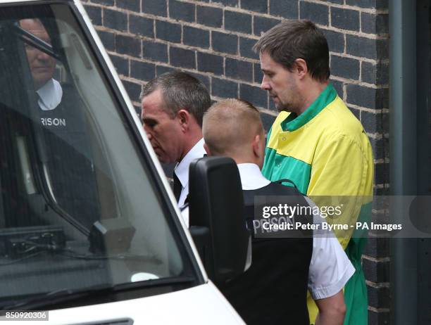 Mark Bridger leaves Mold Crown Court after he was given a whole life sentence for the abduction and murder of schoolgirl April Jones.