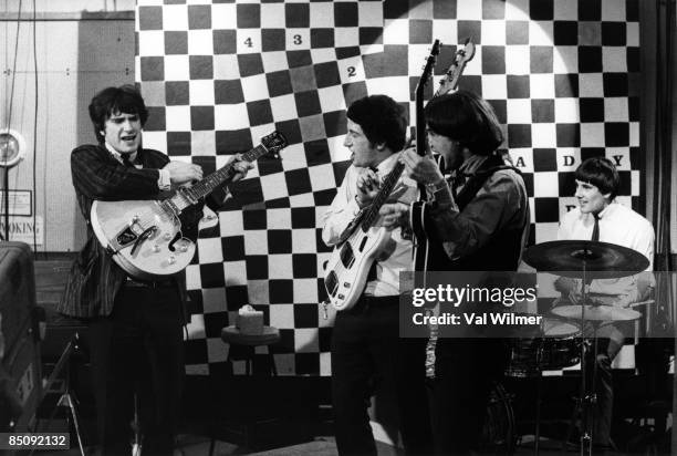 Photo of KINKS and Ray DAVIES and Pete QUAIFE and Dave DAVIES and Mick AVORY, Group performing on tv show L-R Ray Davies, Pete Quaife, Dave Davies...