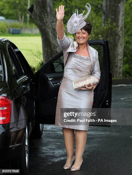 Diane McConnell, mother of the bride, Helen McConnell, arrives for her wedding to Manchester United footballer Jonny Evans as at Clough Presbyterian...