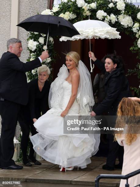 Bride Helen McConnell arrives for her wedding to Manchester United footballer Jonny Evans as at Clough Presbyterian Church, County Down.