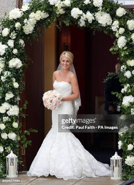 Bride Helen McConnell arrives for her wedding to Manchester United footballer Jonny Evans as at Clough Presbyterian Church, County Down.
